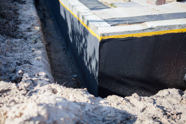 Professional Waterproofing technician working in Norwood, NJ